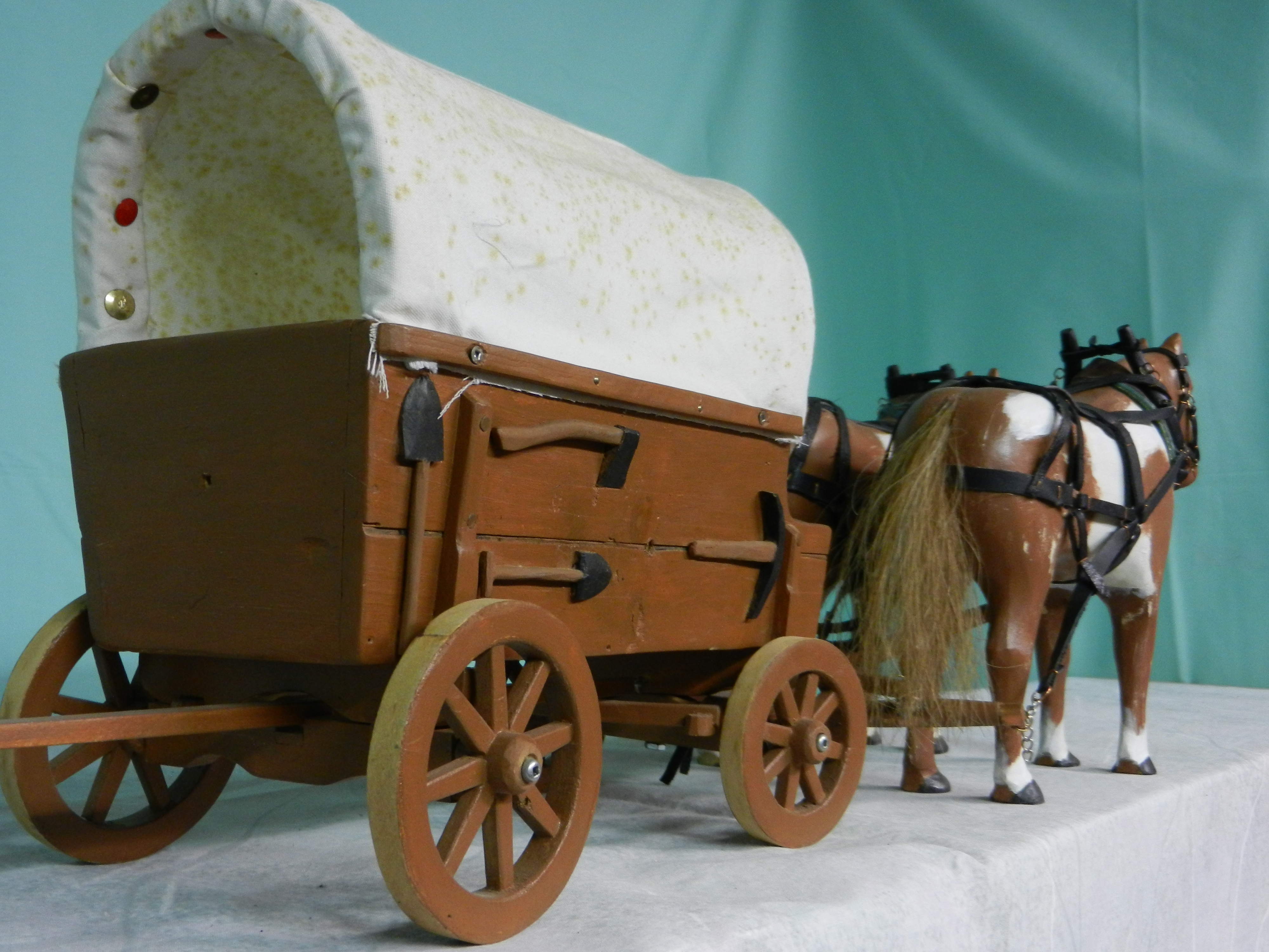 Horses & covered wagon